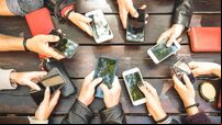 People group having addicted fun together using smartphones - Detail of hands sharing content on social network with mobile smar