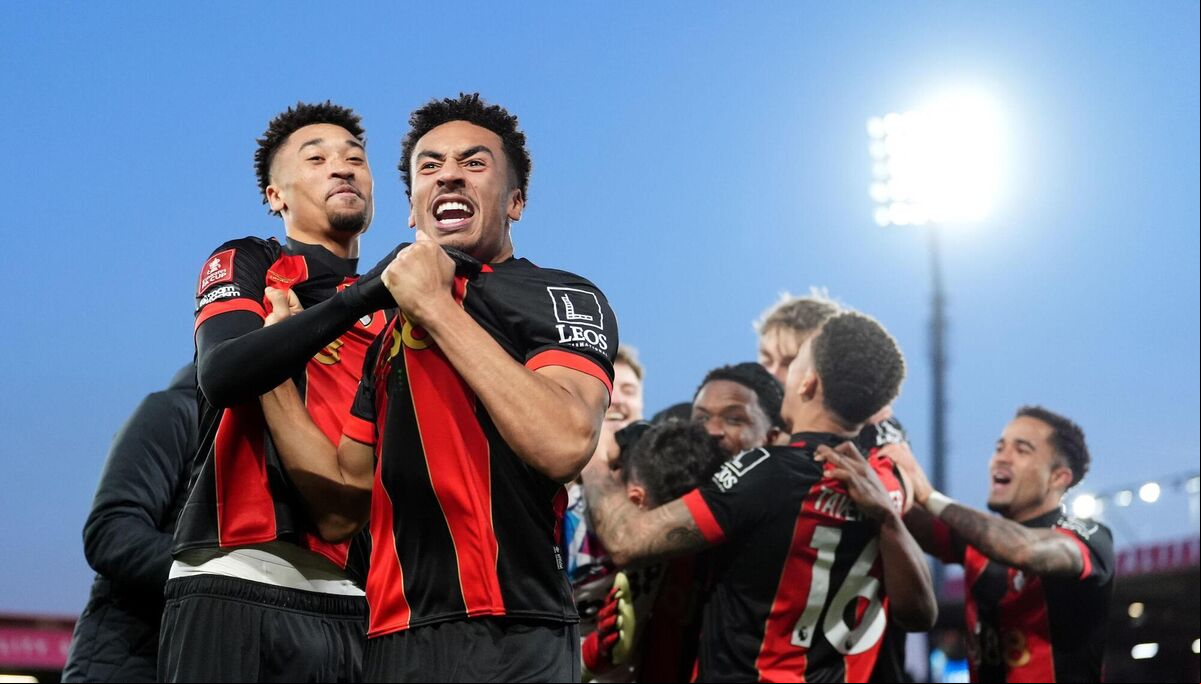 Bournemouth's James Hill (centre) and team-mates celebrate winning on penalties against Wolves after the Emirates FA Cup fifth round match at the Vitality Stadium, Bournemouth. Picture: Adam Davy/PA Wire.