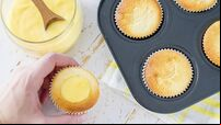 Lemon cupcakes preparation - cupcakes in forms, curd