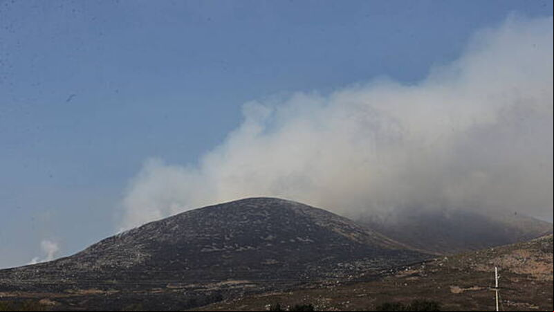 75 firefighters involved in quelling wildfire in Mournes but blazes continue 75 firefighters involved in quelling wildfire in Mournes but blazes continue