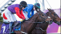 Robyn Donaghue-Leahy (blue silks) onboard Not Just Any Eagle comes home to win ahead of Jody Townend (red and purlpe silks) onbo