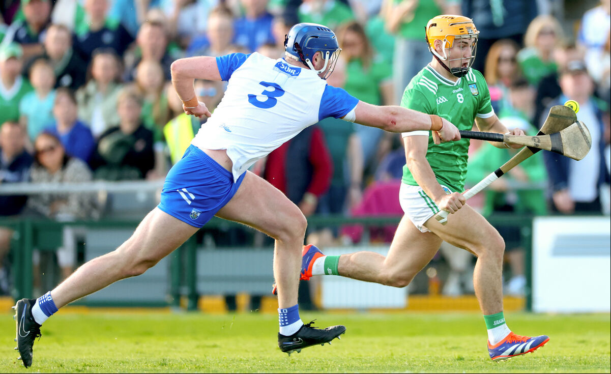 Waterford’s Conor Prunty and Adam English of Limerick races away from Waterford's Conor Prunty during the Munster GAA Senior Hurling Championship Round 3, Walsh Park, Waterford. Picture: ©INPHO/James Crombie