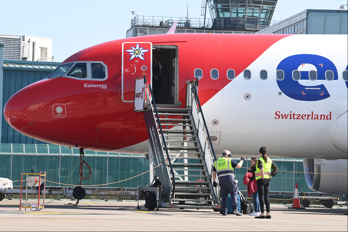 Ground crew assist with boarding an edelweiss aircraft at Cork Airport. Picture Larry Cummins Ground crew assist with boarding an edelweiss aircraft at Cork Airport. Picture Larry Cummins