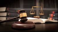 Judge gavel and scale in court. Legal concept