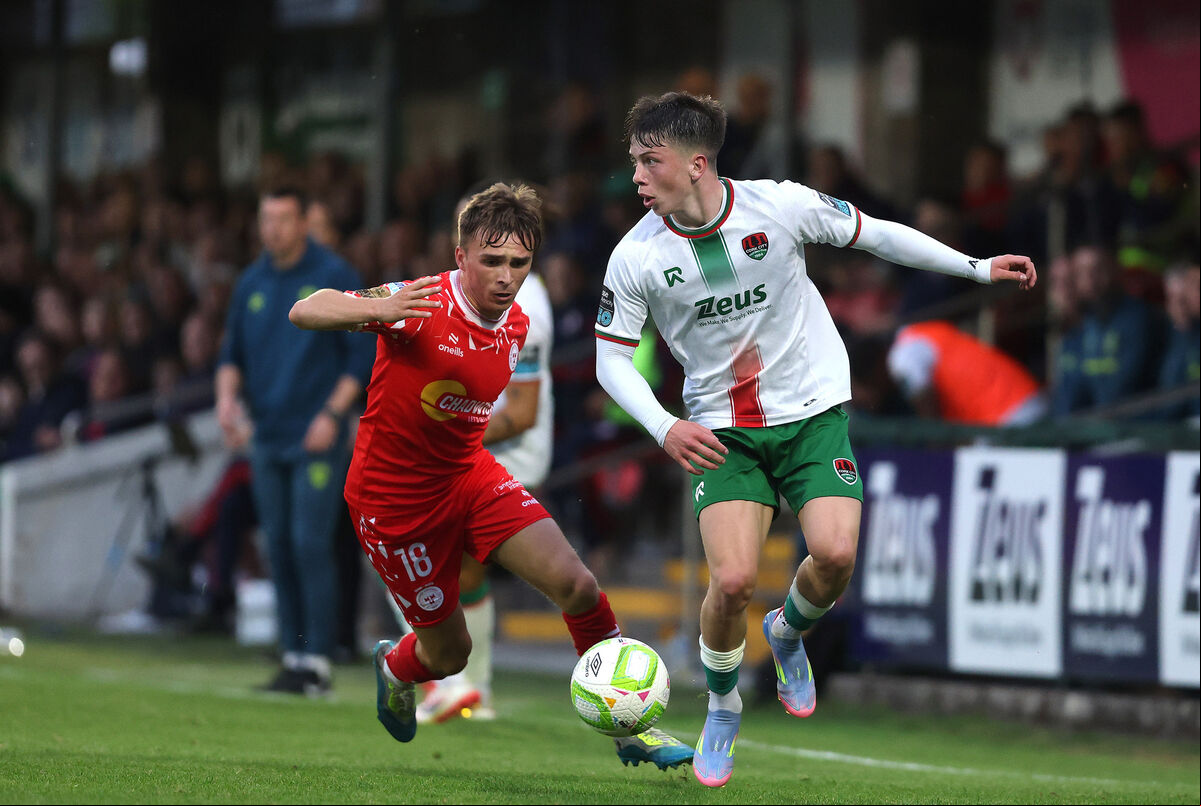 Shelbourne's James Norris tackles Cathal O'Sullivan of Cork City. Picture: INPHO/Bryan Keane