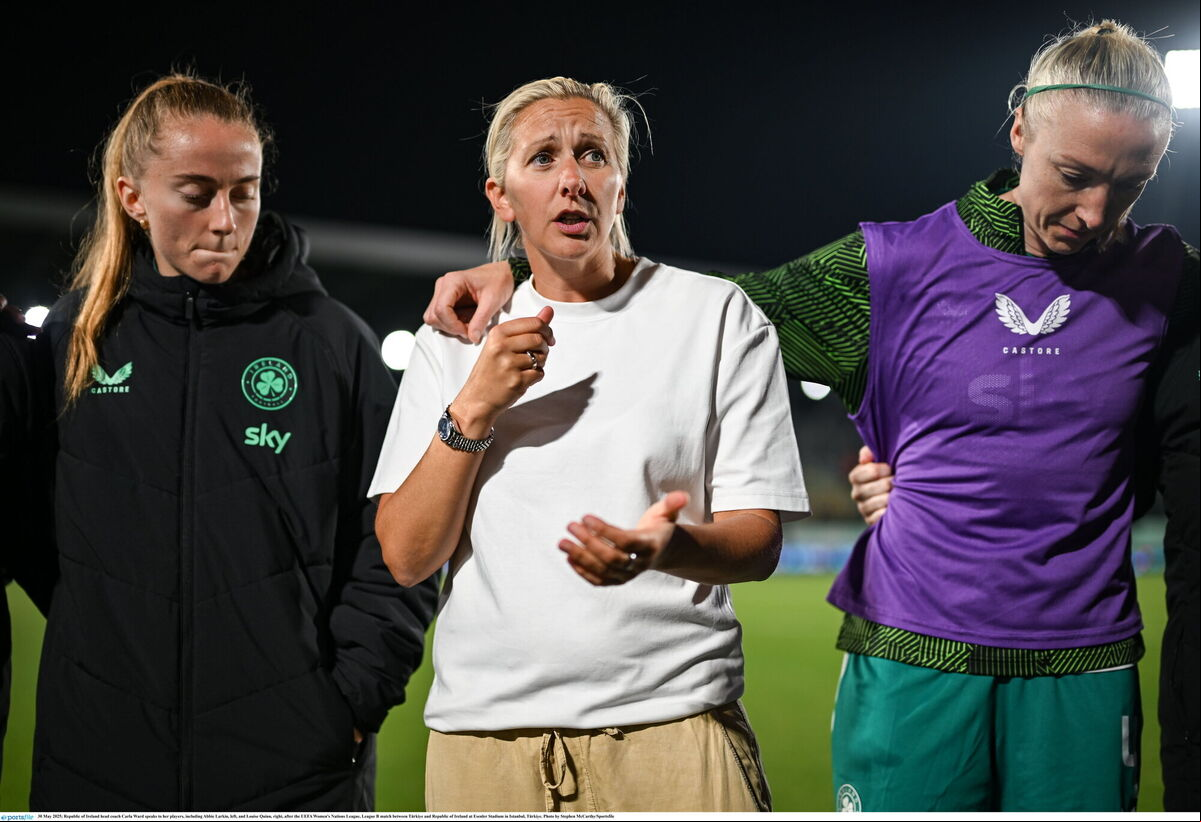 Republic of Ireland head coach Carla Ward speaks to her players, including Abbie Larkin, left, and Louise Quinn, right, after the UEFA Women's Nations League, League B match between Türkiye and Republic of Ireland at Esenler Stadium in Istanbul, Türkiye. Photo by Stephen McCarthy/Sportsfile Republic of Ireland head coach Carla Ward speaks to her players, including Abbie Larkin, left, and Louise Quinn, right, after the UEFA Women's Nations League, League B match between Türkiye and Republic of Ireland at Esenler Stadium in Istanbul, Türkiye. Photo by Stephen McCarthy/Sportsfile