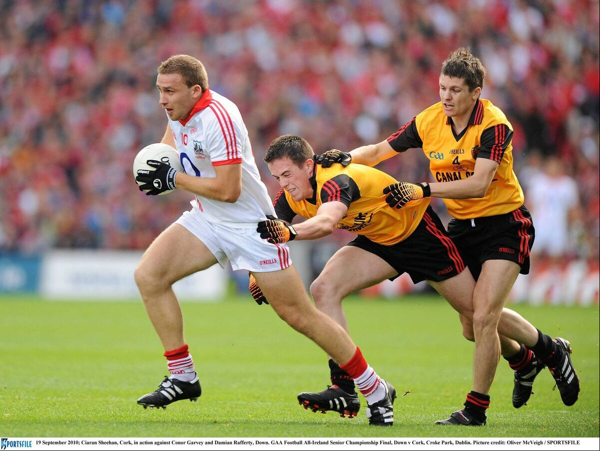 Cork's Ciarán Sheehan in action against Conor Garvey and Damian Rafferty of Down in 2010. Picture: Oliver McVeigh/Sportsfile Cork's Ciarán Sheehan in action against Conor Garvey and Damian Rafferty of Down in 2010. Picture: Oliver McVeigh/Sportsfile