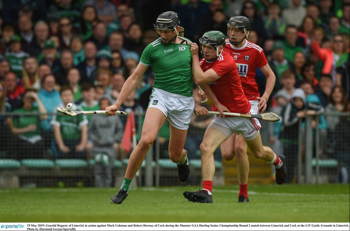 Gearóid Hegarty of Limerick in action against Mark Coleman and Robert Downey of Cork during the Munster GAA Hurling Senior Championship Round 2 match between Limerick and Cork in 2019. Picture: Diarmuid Greene/Sportsfile Gearóid Hegarty of Limerick in action against Mark Coleman and Robert Downey of Cork during the Munster GAA Hurling Senior Championship Round 2 match between Limerick and Cork in 2019. Picture: Diarmuid Greene/Sportsfile