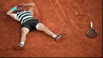 Carlos Alcaraz defends French Open title after epic tussle with Jannik Sinner