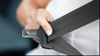 Hand pulling seat belt