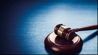 judge gavel on a blue wooden background